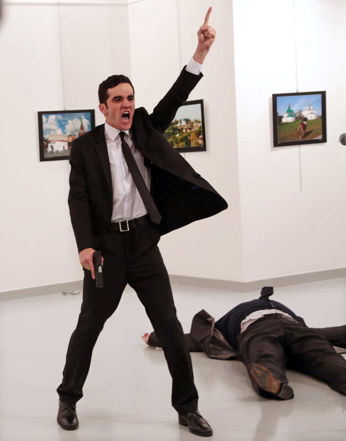 An Assassination / Copyright 2016 The Associated Press. All rights reserved., Burhan Ozbilici Mevlut Mert Altintas shouts after shooting Andrei Karlov, right, the Russian ambassador to Turkey, at an art gallery in Ankara, Turkey, Monday, Dec. 19, 2016.  (AP Photo/Burhan Ozbilici)